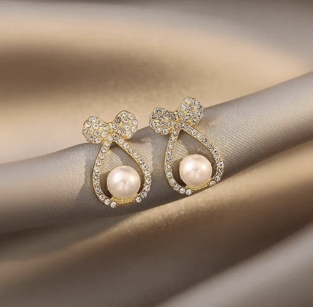 Charming Bow-Accented Crystal And Pearl Earrings